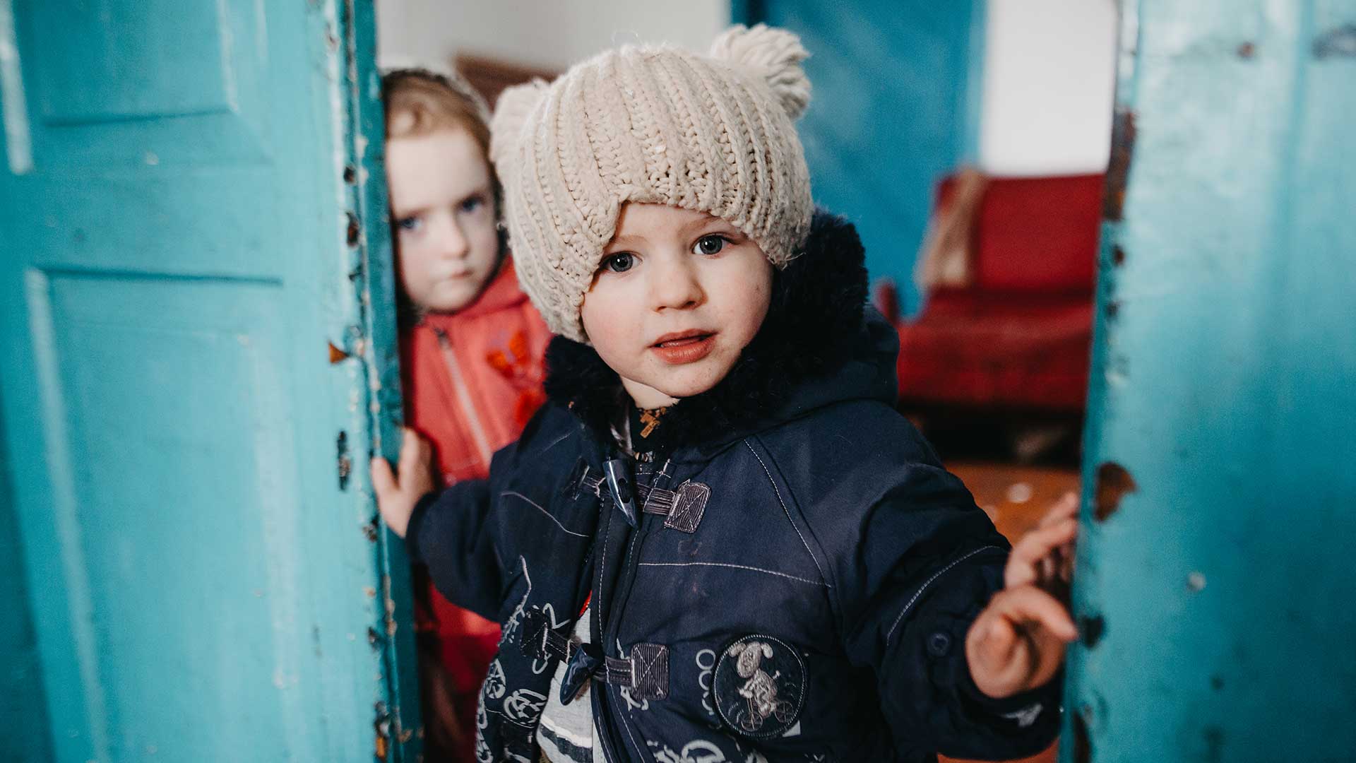 Young children in doorway